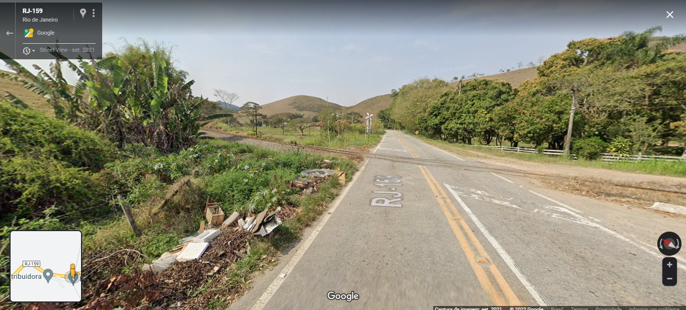 Placa de sinalização na estrada Descrição gerada automaticamente